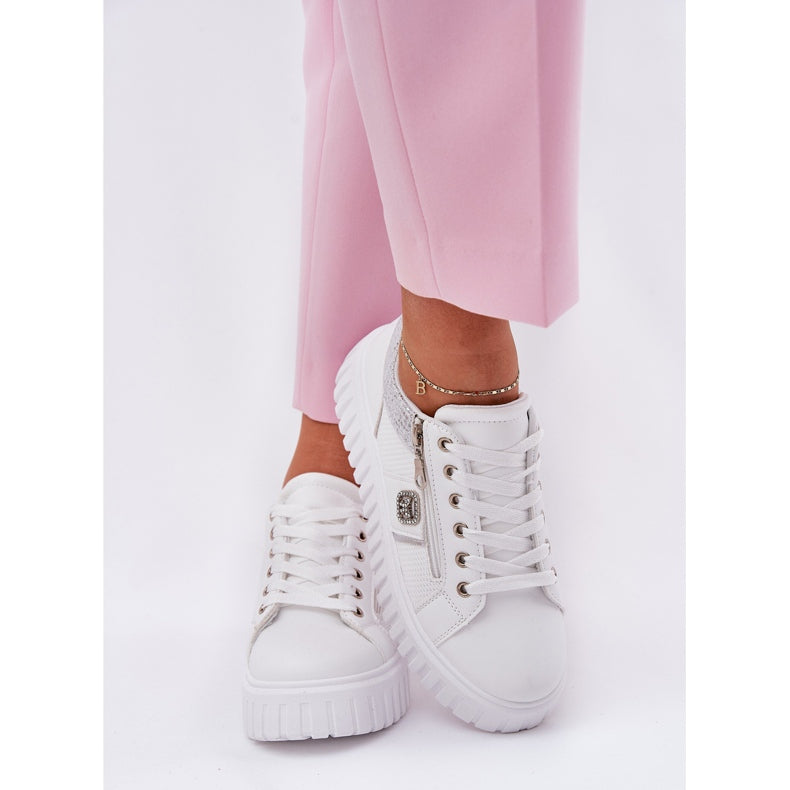 White trainers woman