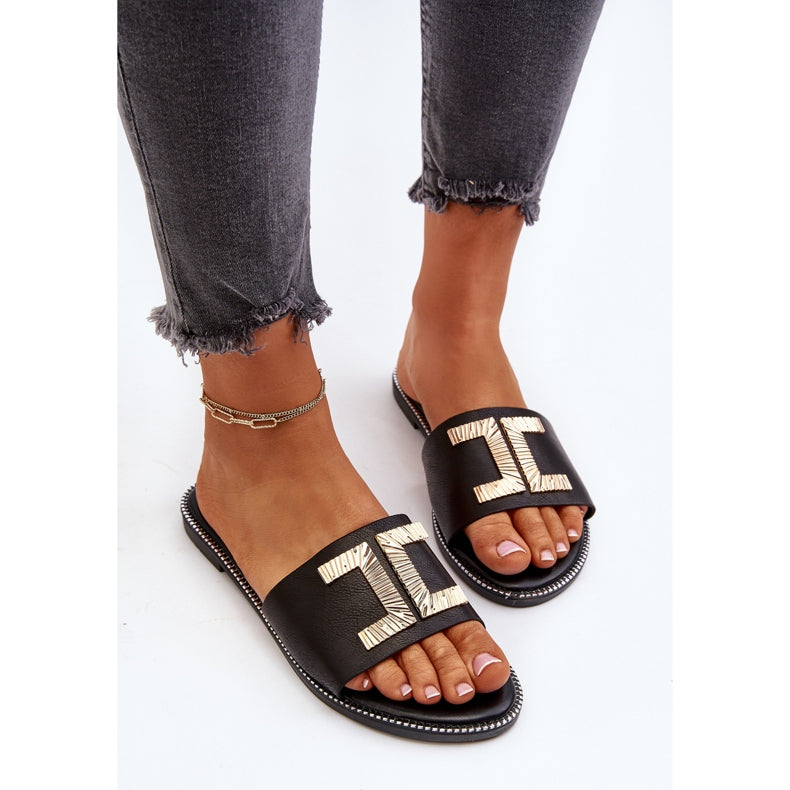 Black Flat Sandal for Woman with Chic Gold Decoration